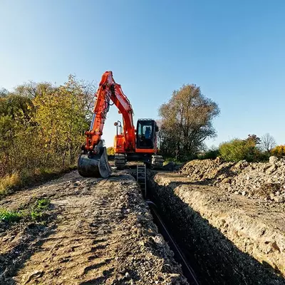 Photos d'une pelle de chantier qui creuses